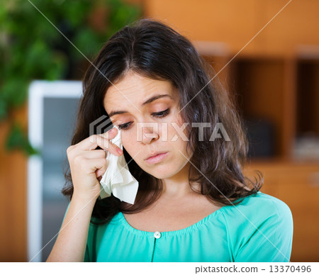 crying woman at home crying woman at home 13370496