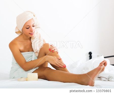 Young woman caring for legs 13370801