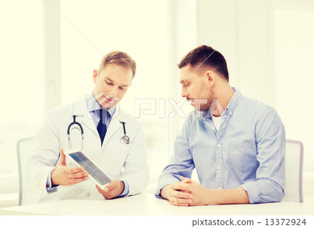 doctor with tablet pc and patient in hospital 13372924