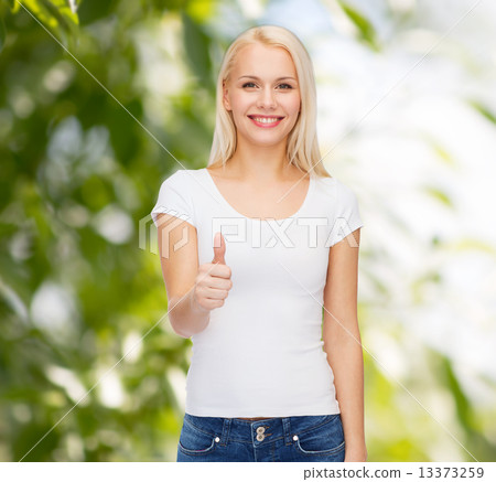 woman showing thumbs up woman showing thumbs up 13373259