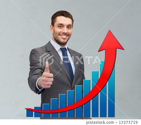 smiling young businessman showing thumbs up smiling young businessman showing thumbs up 13373719
