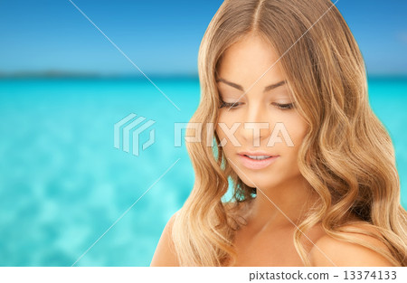 beautiful young woman with bare shoulders 13374133