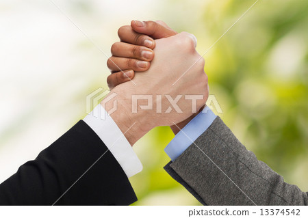 hands of two people arm wrestling 13374542
