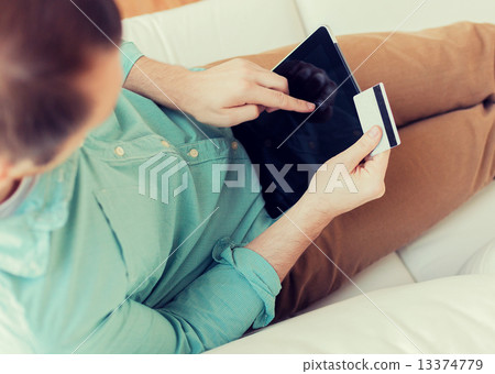 close up of man with laptop and credit card close up of man with laptop and credit card 13374779