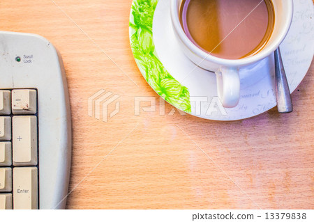 Cup of coffee at office Cup of coffee at office 13379838
