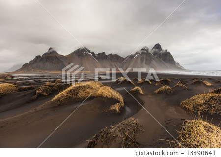 Vesturhorn Mountain and black sand dunes, Iceland Vesturhorn Mountain and black sand dunes, Iceland 13390641
