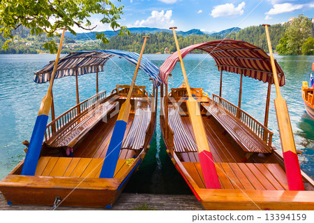 Traditional wooden boats on lake Bled, Slovenia. Traditional wooden boats on lake Bled, Slovenia. 13394159
