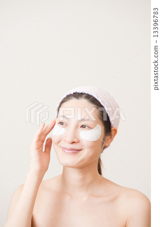 Women with facial care 13396783