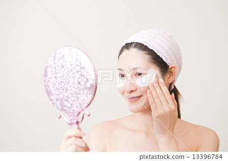 Women with facial care 13396784