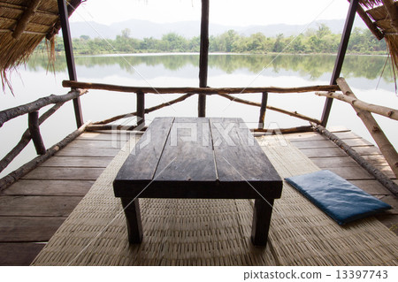 Wood Table at riverside terrace. 13397743