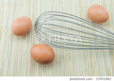 close up of meat whisk and eggs close up of meat whisk and eggs 13441962
