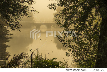 A golden dawn on Minnewater in Bruges 13448122