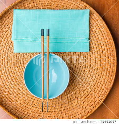 Empty rice bowl with bamboo chopsticks 13453057