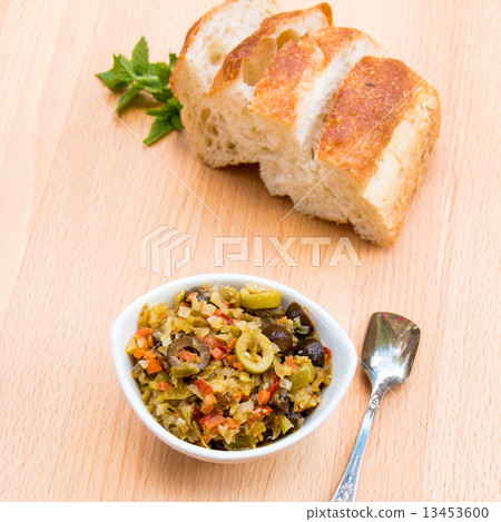 Pickled olive muffalatta salad with finely chopped cauliflower a 13453600