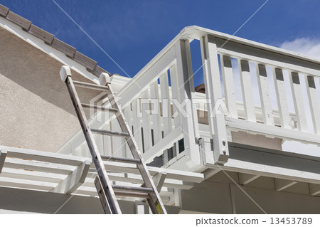 Construction Ladder Leaning on White House Deck Construction Ladder Leaning on White House Deck 13453789