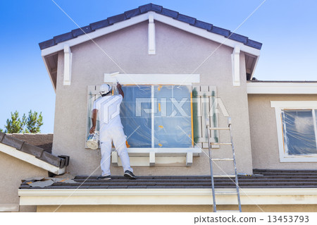 House Painter Painting the Trim And Shutters of Home House Painter Painting the Trim And Shutters of Home 13453793