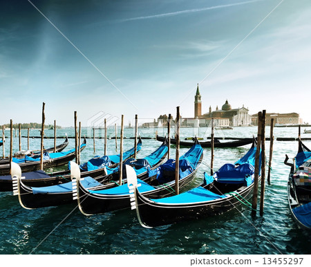 Gondolas on Grand Canal and San Giorgio Maggiore church in Venic 13455297