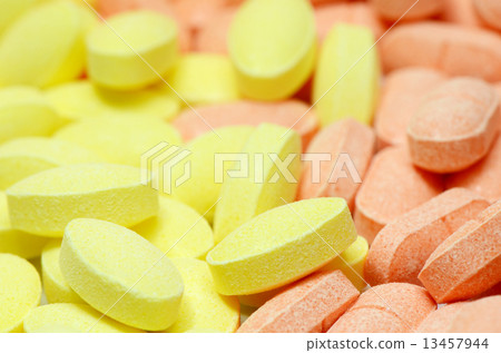 Various colors of vitamin C pills (Ascorbic acid). 13457944