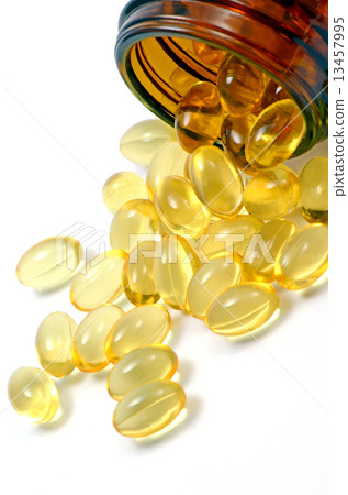 Oval shape of soft gelatin capsule isolated on white background. Oval shape of soft gelatin capsule isolated on white background. 13457995