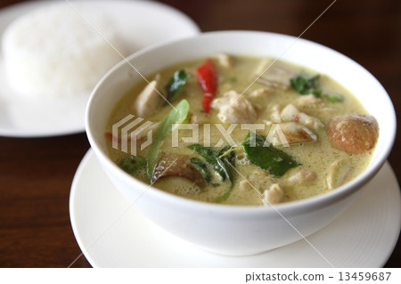 Thai food chicken green curry with rice in wood background Thai food chicken green curry with rice in wood background 13459687
