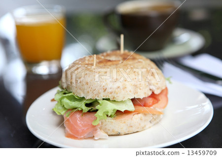 fresh bagel with salmon orange juice and coffee fresh bagel with salmon orange juice and coffee 13459709