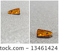 amber stone set sand baltic sea natural background 13461424