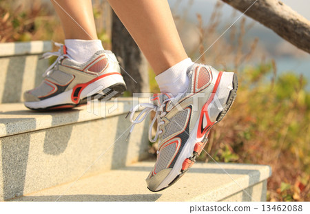 sports legs running/climbing on mountain stairs  13462088