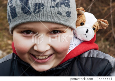Little boy with his puppy toy 13463351