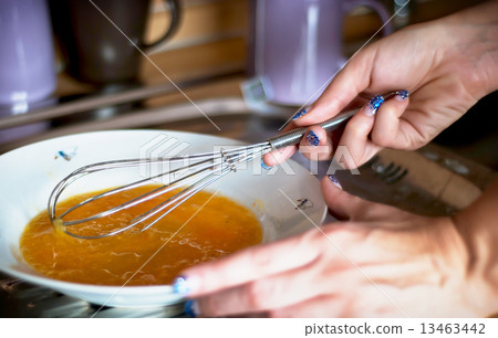Preparing eggs for breakfast 13463442