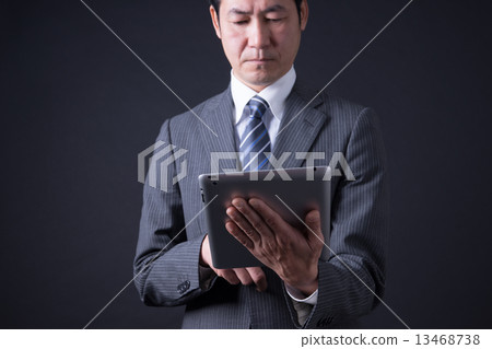Middle businessman 13468738
