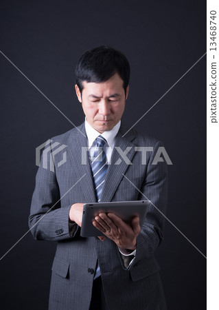 Middle businessman 13468740