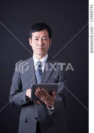 Middle businessman 13468741