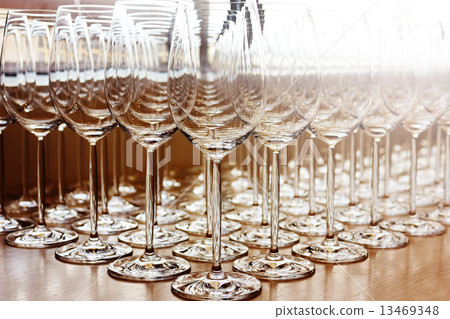 Rows of shiny empty high glasses 13469348