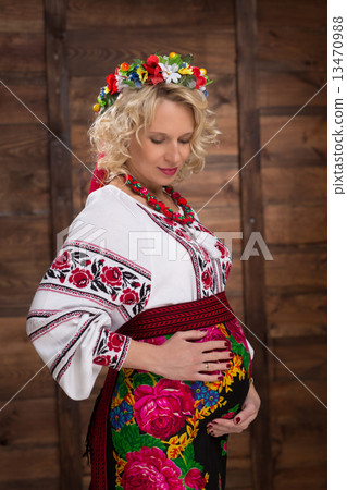 Ukrainian pregnant woman in vyshyvanka Ukrainian pregnant woman in vyshyvanka 13470988