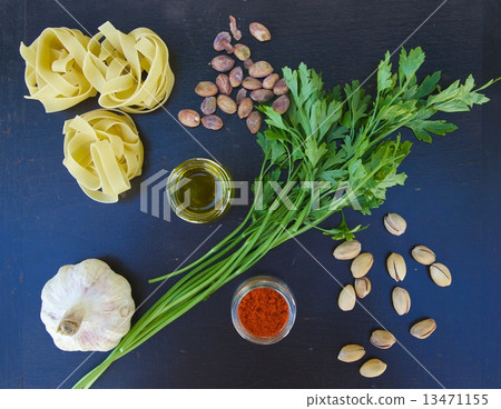 Ingredients for preparing pasta with pistachio pesto 13471155