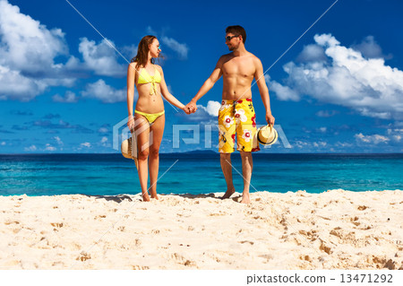 Couple on a beach at Seychelles 13471292