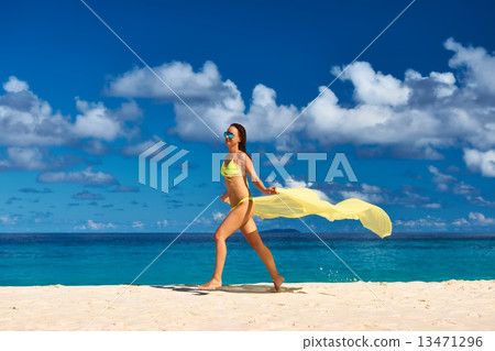 Woman with sarong at beach Woman with sarong at beach 13471296