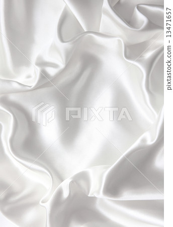 Smooth elegant white silk as wedding background Smooth elegant white silk as wedding background 13471657