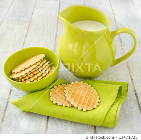 Waffles with jug of milk 13471723