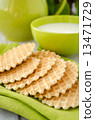 Waffles on a green table napkin closeup 13471729