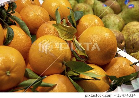 Juicy ripe oranges on the counter 13474334