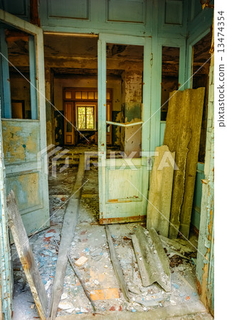 Dilapidated passage in school of Pripyat. Chernobyl Disaster 13474354
