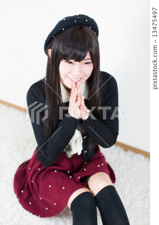 A young lady rejoicing 13475497