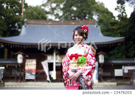 A woman in kimono shape A woman in kimono shape 13476203