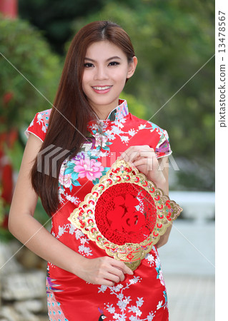 Beautiful girl in attractive Cheongsam Beautiful girl in attractive Cheongsam 13478567