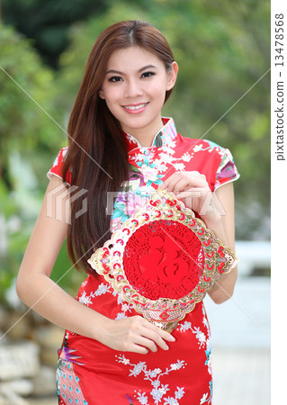 Beautiful girl in attractive Cheongsam Beautiful girl in attractive Cheongsam 13478568
