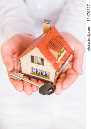 House in human hands House in human hands 13479237