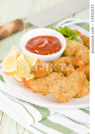 Breaded Butterfly Prawns - Fried prawns filled with garlic sauce Breaded Butterfly Prawns - Fried prawns filled with garlic sauce 13482633
