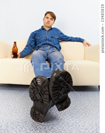 Drunk dude sprawled on couch Drunk dude sprawled on couch 13483819