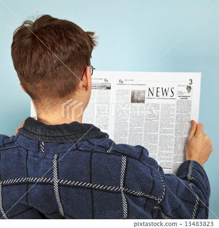 Man reading the newspaper 13483823